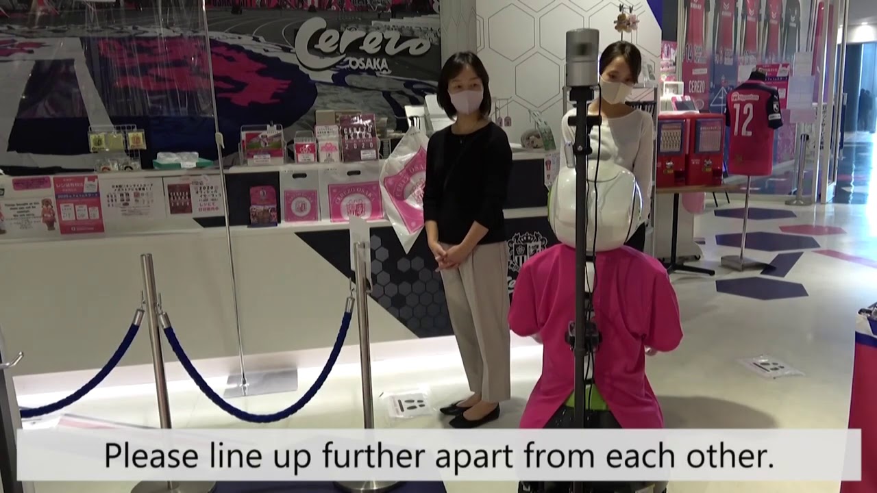Robot reminds Japan shoppers to wear masks